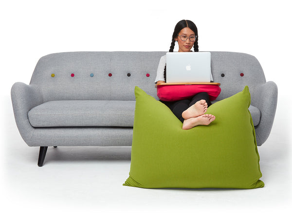 Small square bean bag is multi use, great as a foot rest